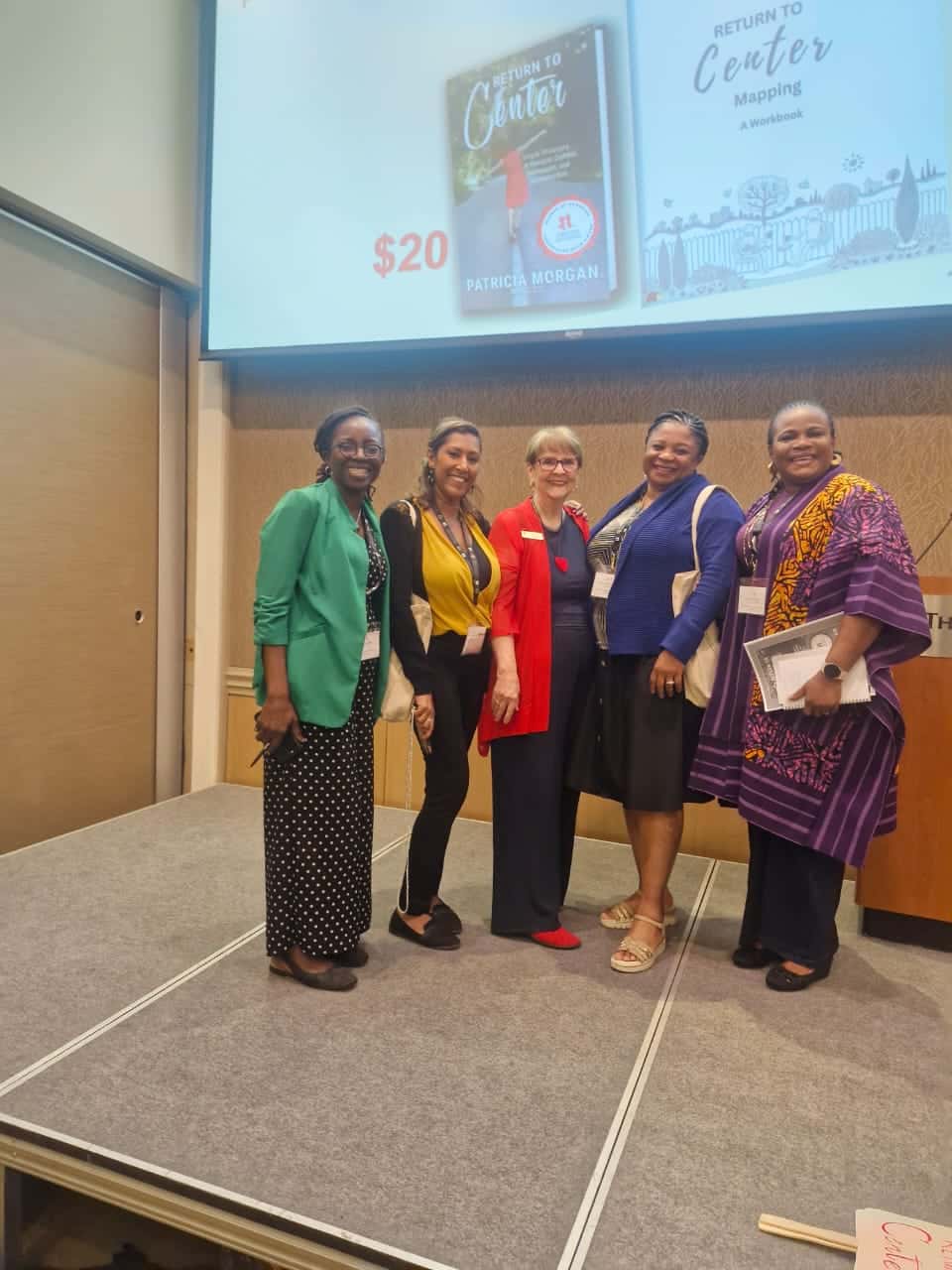 Prof Chinelo Ugwu with colleagues at CCPA conference session