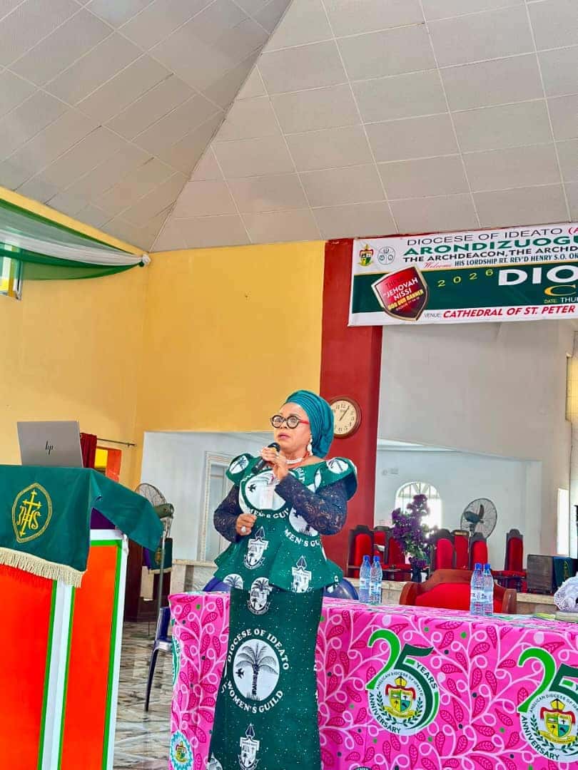 Gilt Counselling Consult speaker at the podium with the conference banner - Event photo 2