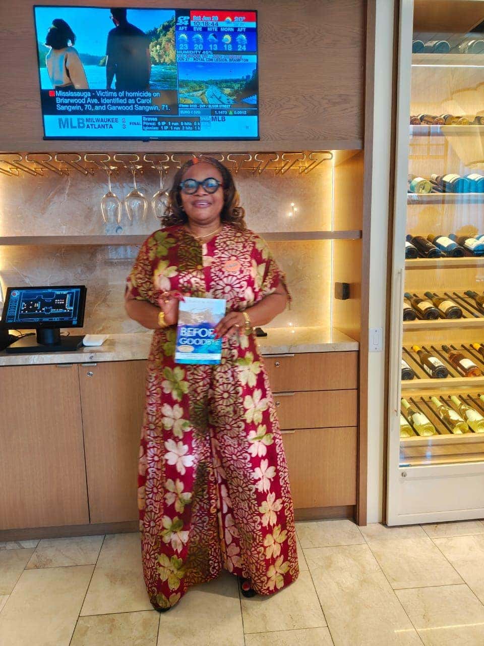 Tracy Heath holding the book Before Goodbye, gifted by Gilt Counselling Consult - Event photo 5